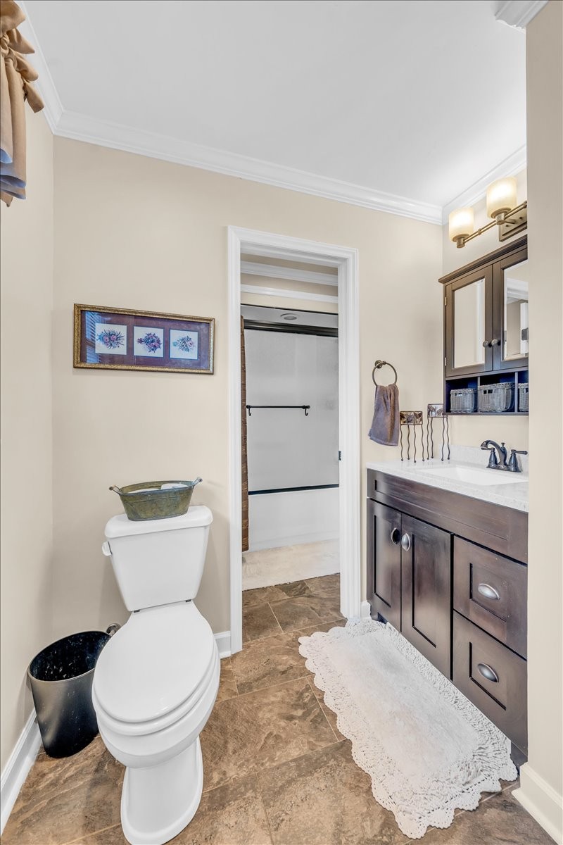 675 Bible Crossing Road Winchester, TN 37398 - Photo 28 of 35 a bathroom with a toilet a sink and mirror