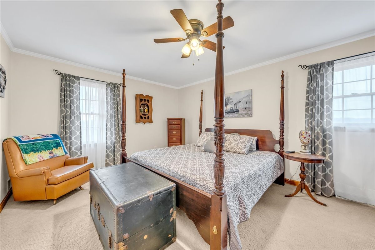 675 Bible Crossing Road Winchester, TN 37398 - Photo 29 of 35 a bed room with a bed and a couch