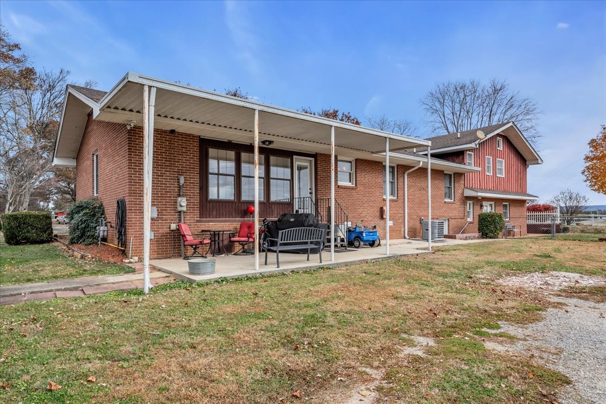 675 Bible Crossing Road Winchester, TN 37398 - Photo 32 of 35 a view of a house with backyard and porch