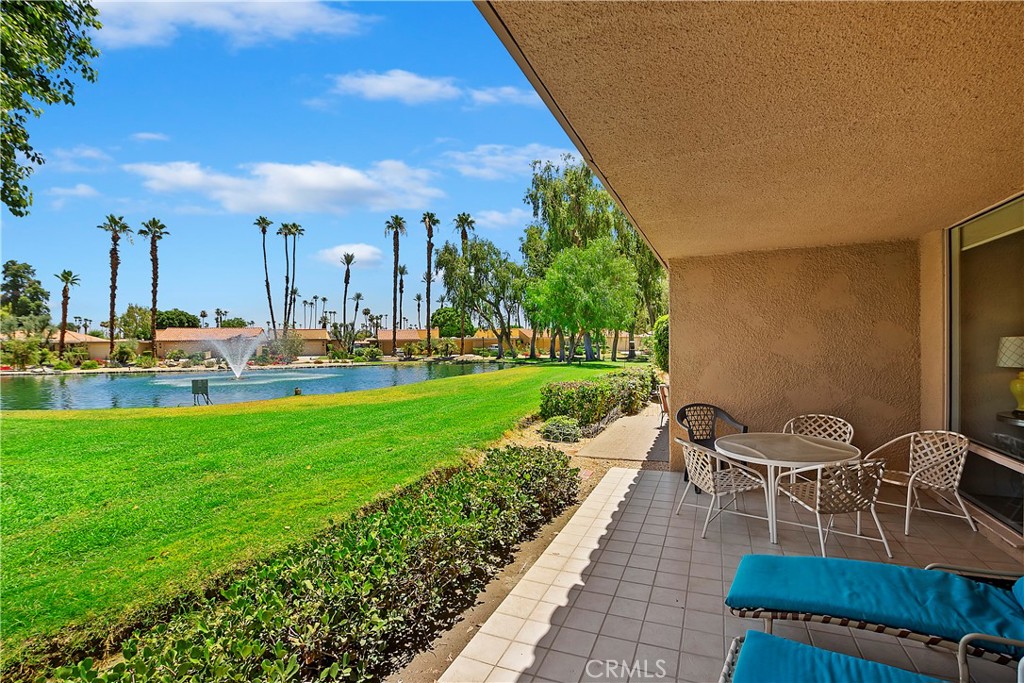 8 Valencia Drive Rancho Mirage, CA 92270 - Photo 1 of 20 a view of a patio with a table and chairs