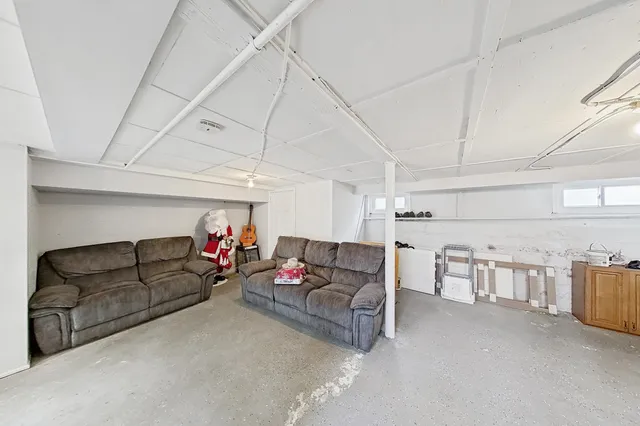 a living room with furniture and a couch