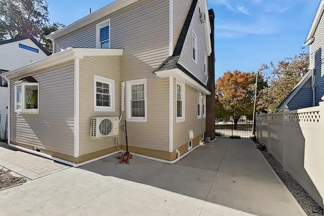 a view of a house with a street