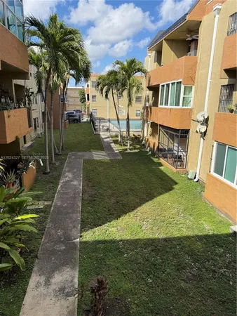 a view of a backyard with a garden