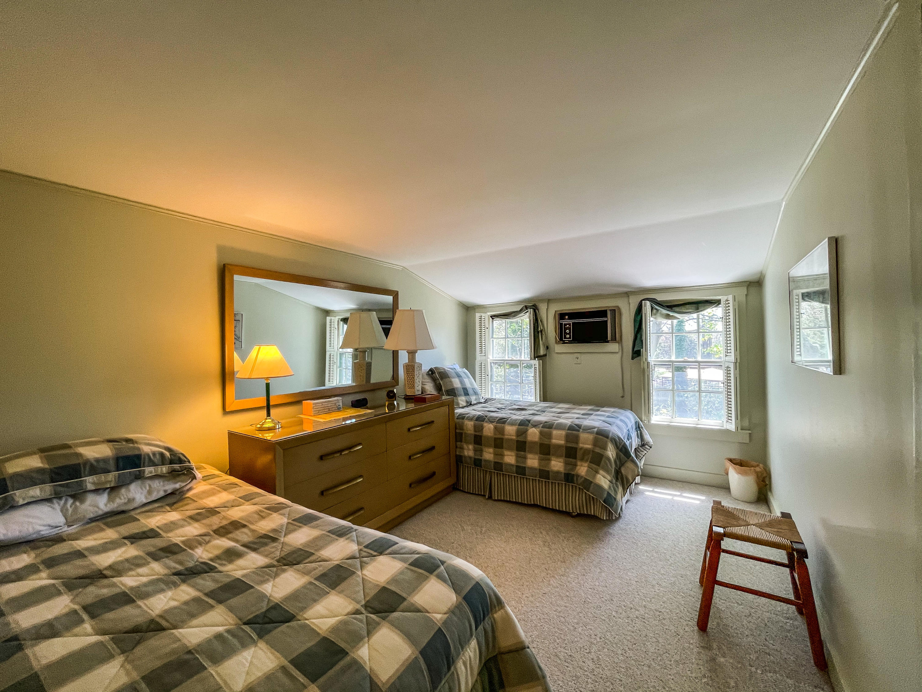 89 Murphy Road Hyannis, MA 02601 - Photo 29 of 42 a bedroom with a bed and wooden floor