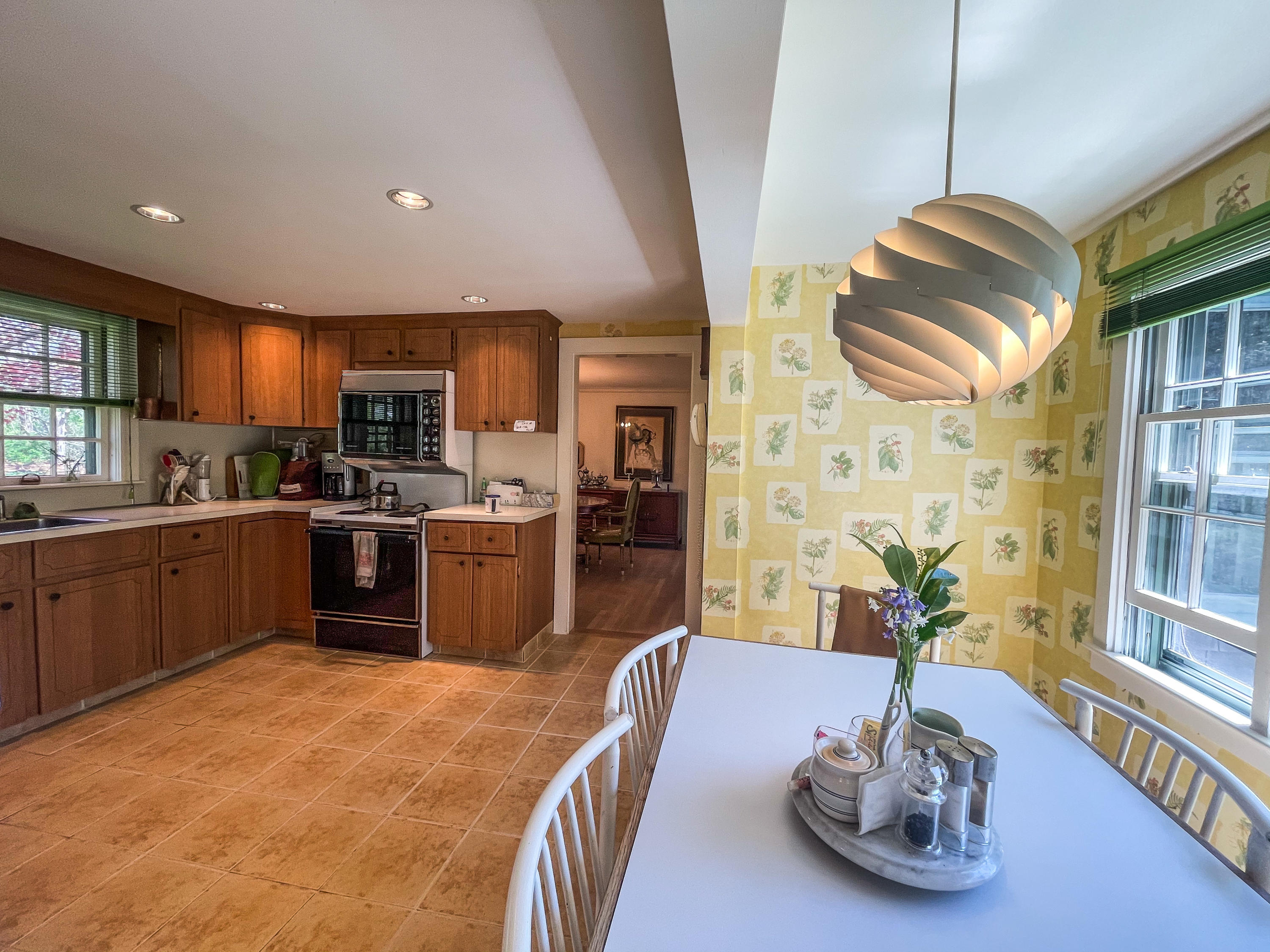 89 Murphy Road Hyannis, MA 02601 - Photo 6 of 42 a kitchen with stainless steel appliances granite countertop a sink a stove and a refrigerator