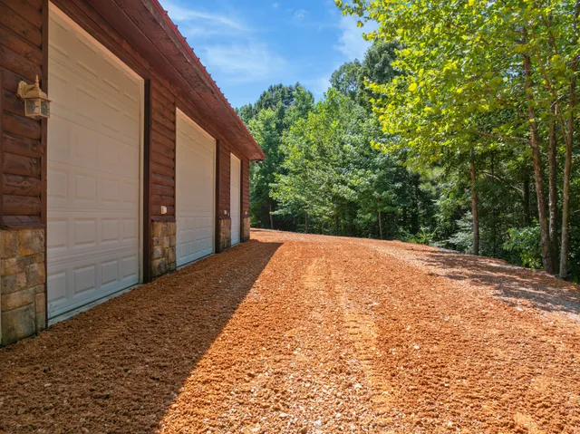 a view of a building with furniture and a fireplace