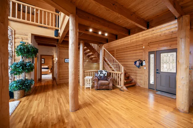 a view of an chairs and table in the balcony