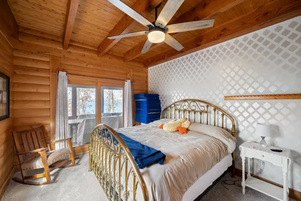 a view of a chairs and table on the deck