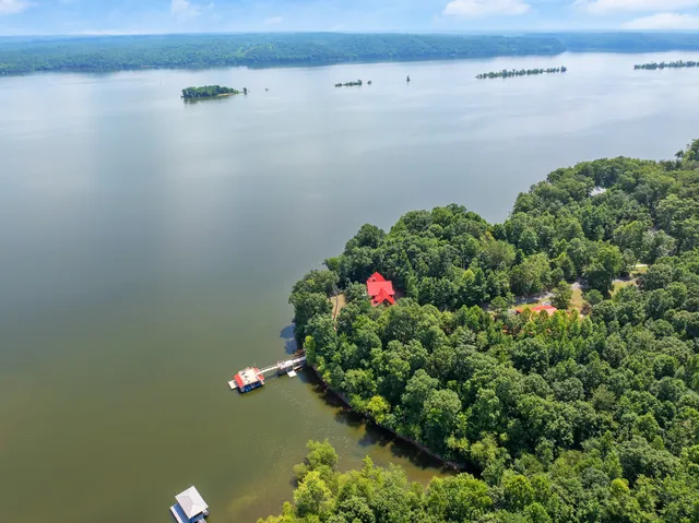 a balcony with trees in front of it