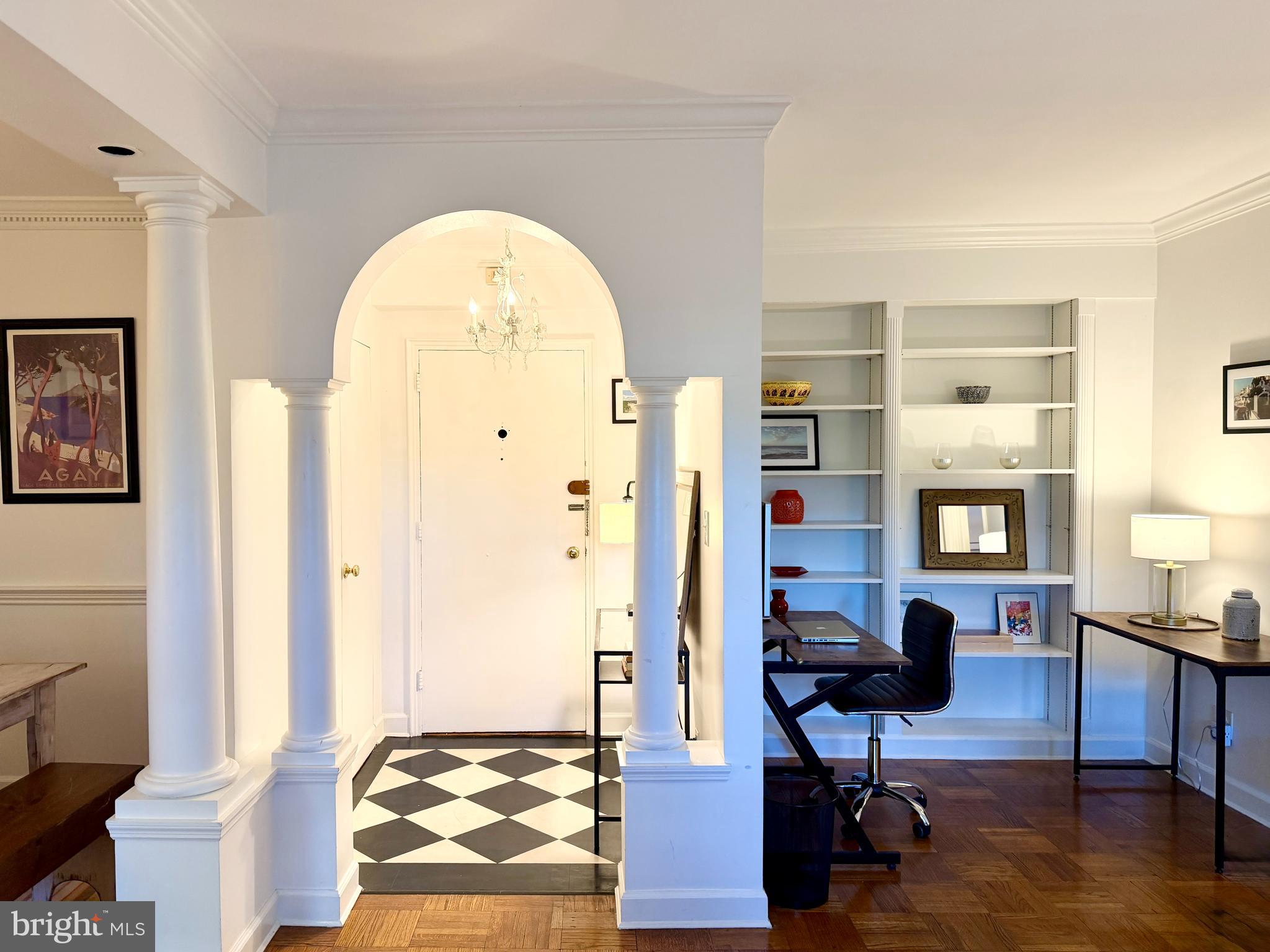 2500 Q Street Northwest, Unit 307 Washington, DC 20007 - Photo 2 of 17 a view of a livingroom with workspace and a window