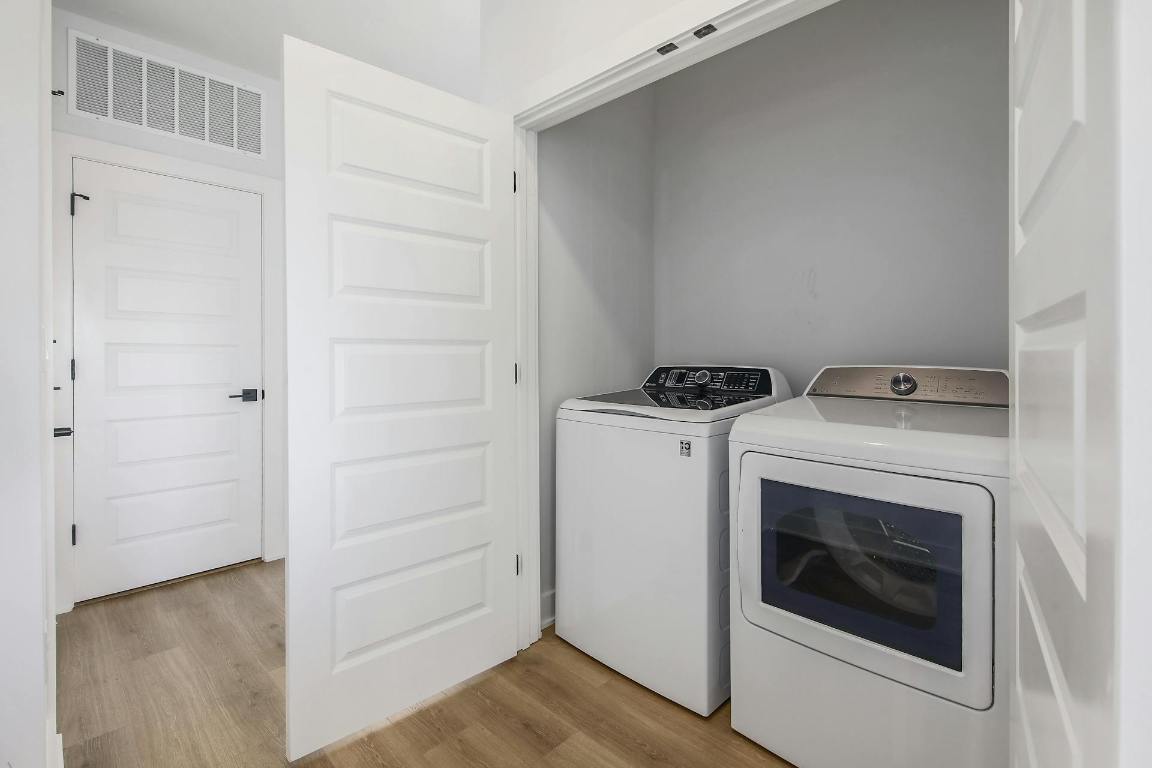 2500 Longview Street, Unit 501 Austin, TX 78705 - Photo 8 of 23 a utility room with dryer and washer