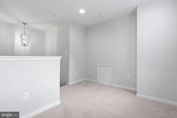 a living room with furniture or couch and a large window