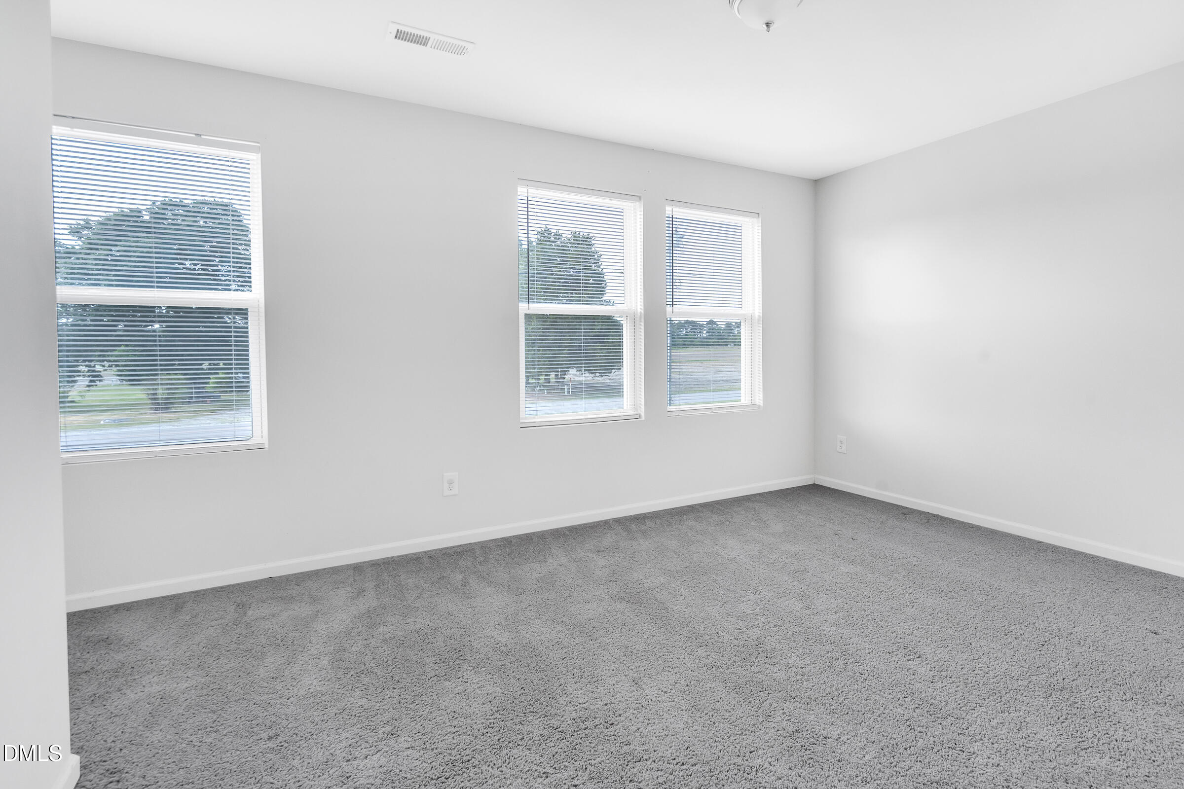 3146 Stoney Hill Church Road Bailey, NC 27807 - Photo 15 of 26 an empty room with a window