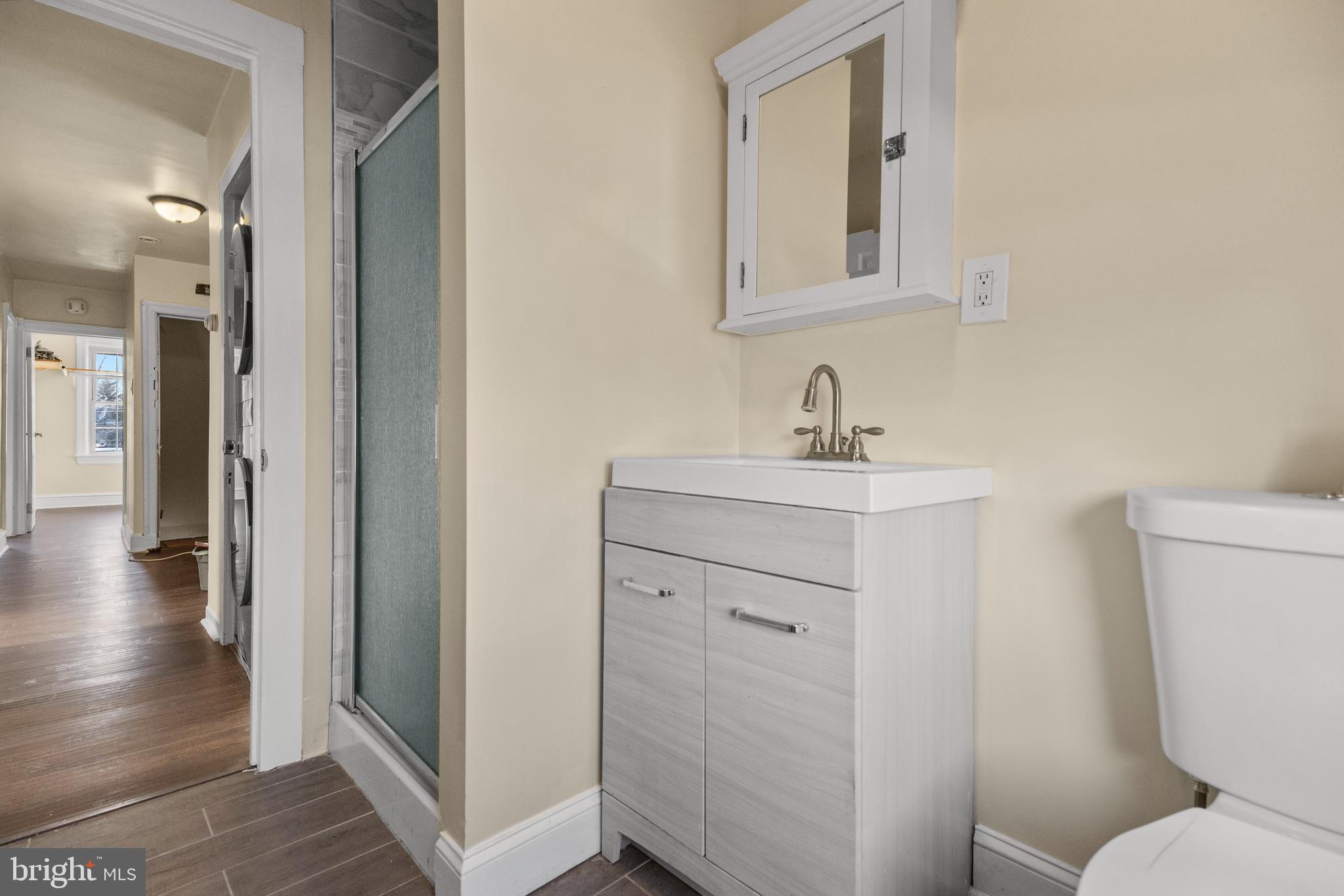 116 Chestnut Street, Unit 2 Audubon, NJ 08106 - Photo 3 of 12 a bathroom with a sink toilet and shower