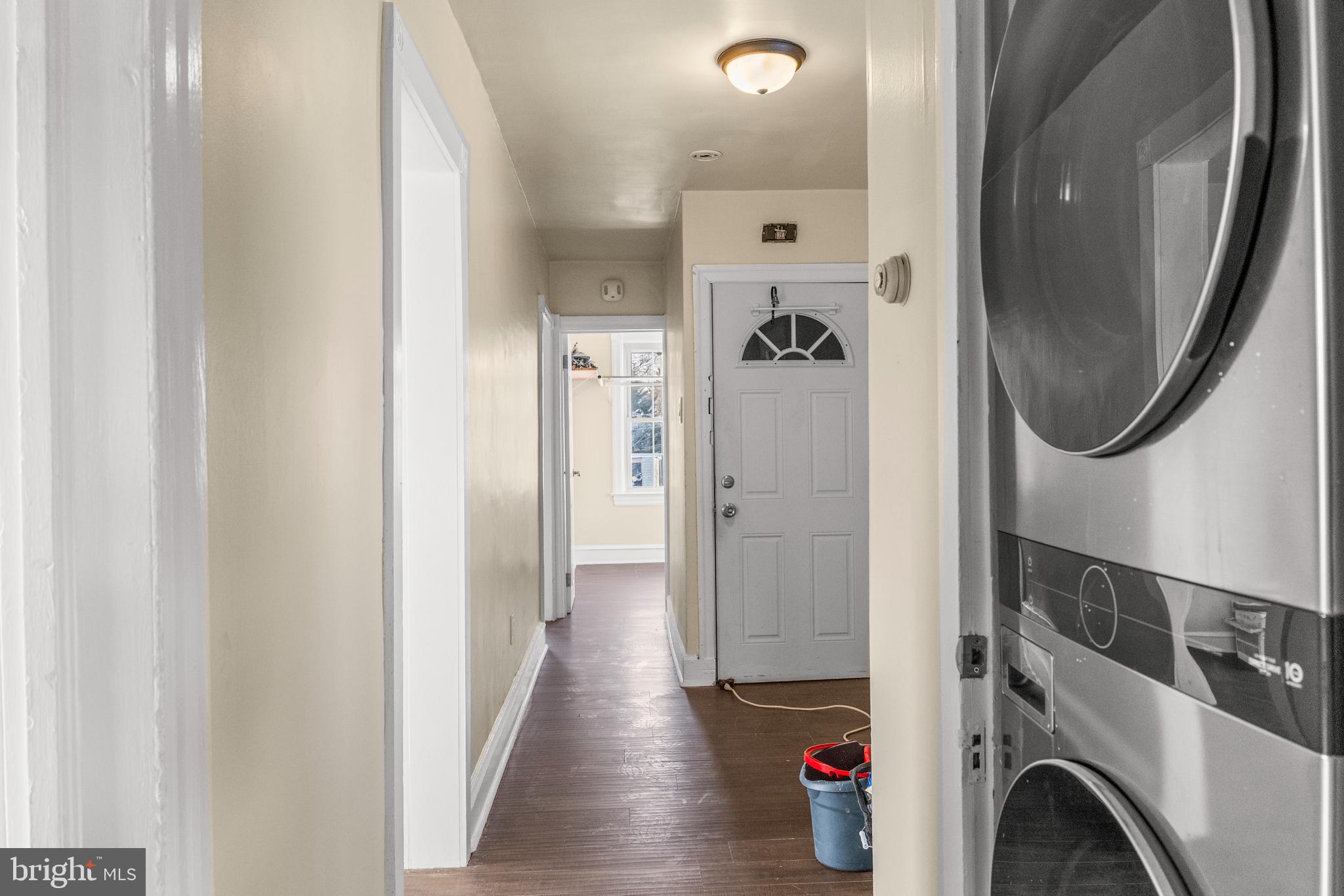 116 Chestnut Street, Unit 2 Audubon, NJ 08106 - Photo 6 of 12 a view of a hallway with washer and dryer