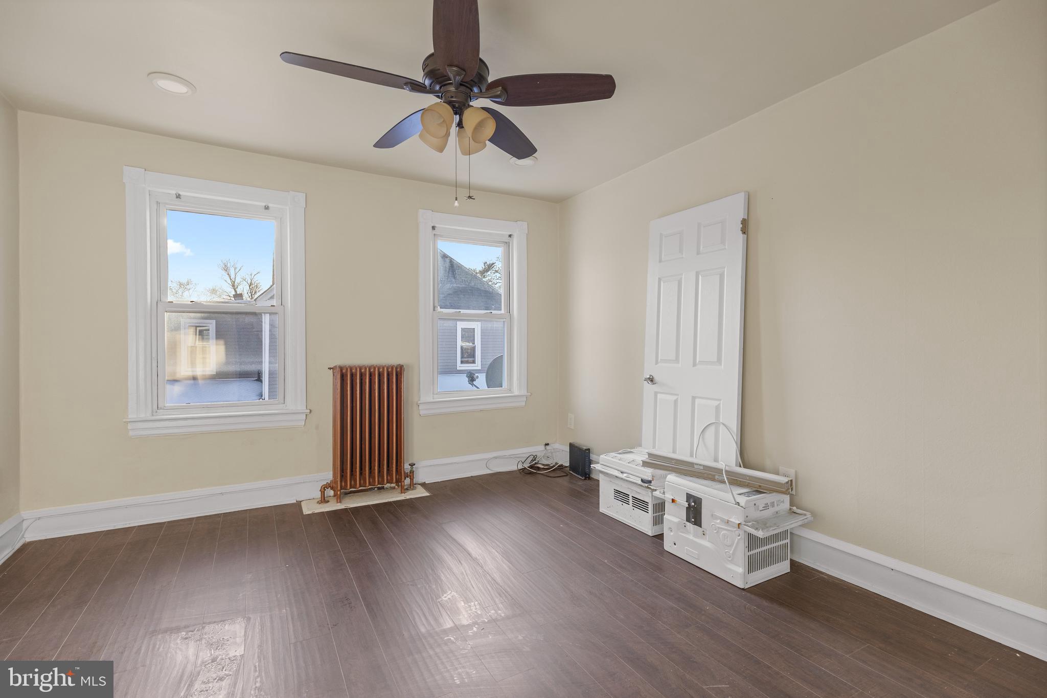 116 Chestnut Street, Unit 2 Audubon, NJ 08106 - Photo 7 of 12 wooden floor in an empty room with a window