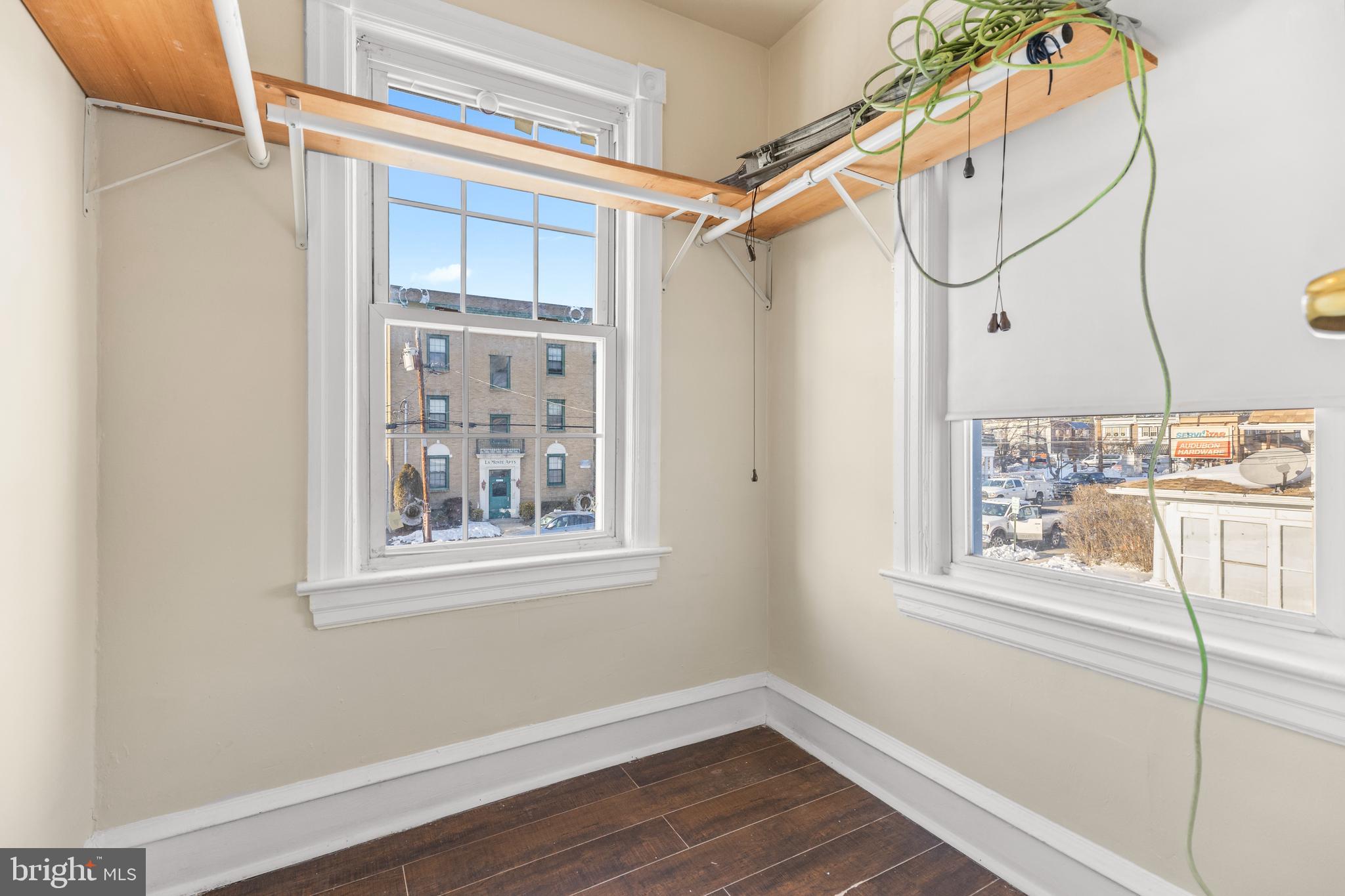 116 Chestnut Street, Unit 2 Audubon, NJ 08106 - Photo 8 of 12 a view of a small space with wooden floor and a window