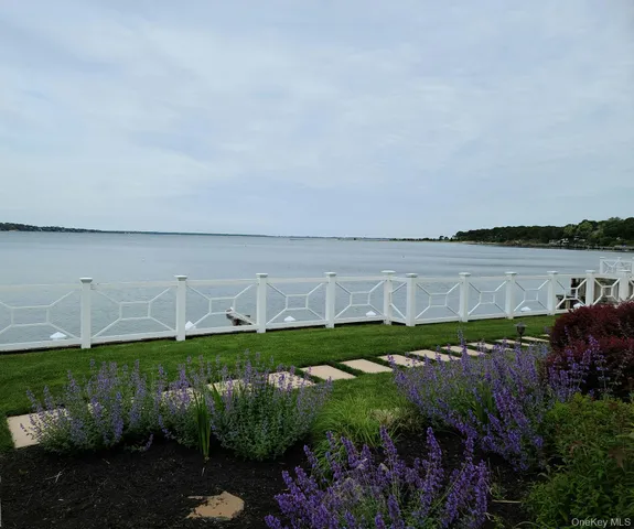 a view of a lake with a building in the background