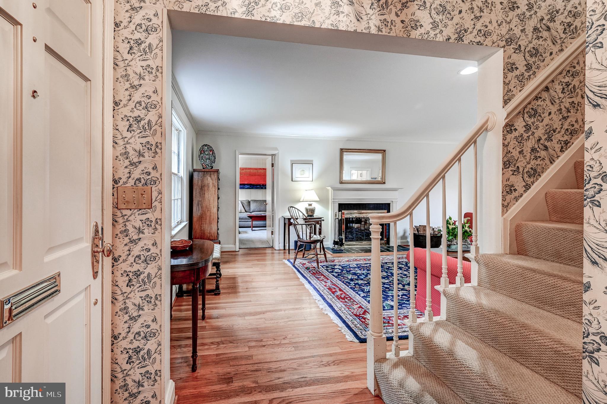 303 Overhill Road Baltimore, MD 21210 - Photo 5 of 45 Center stair flanked by living and dining rooms.