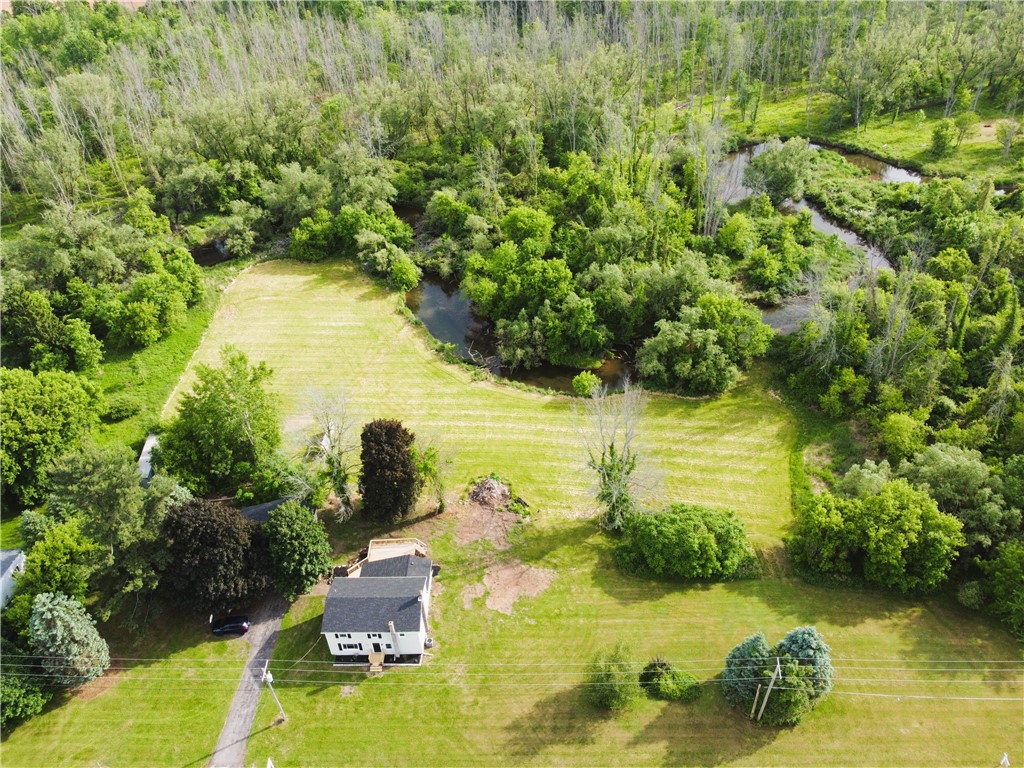 17042 West Ridge Road Murray, NY 14470 - Photo 1 of 1 Aerial view showing Sandy Creek meandering through