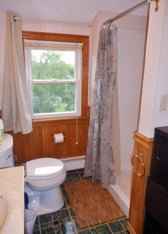 2 Poe Road Billerica, MA 01821 - Photo 22 of 34 a bathroom with a toilet and a shower