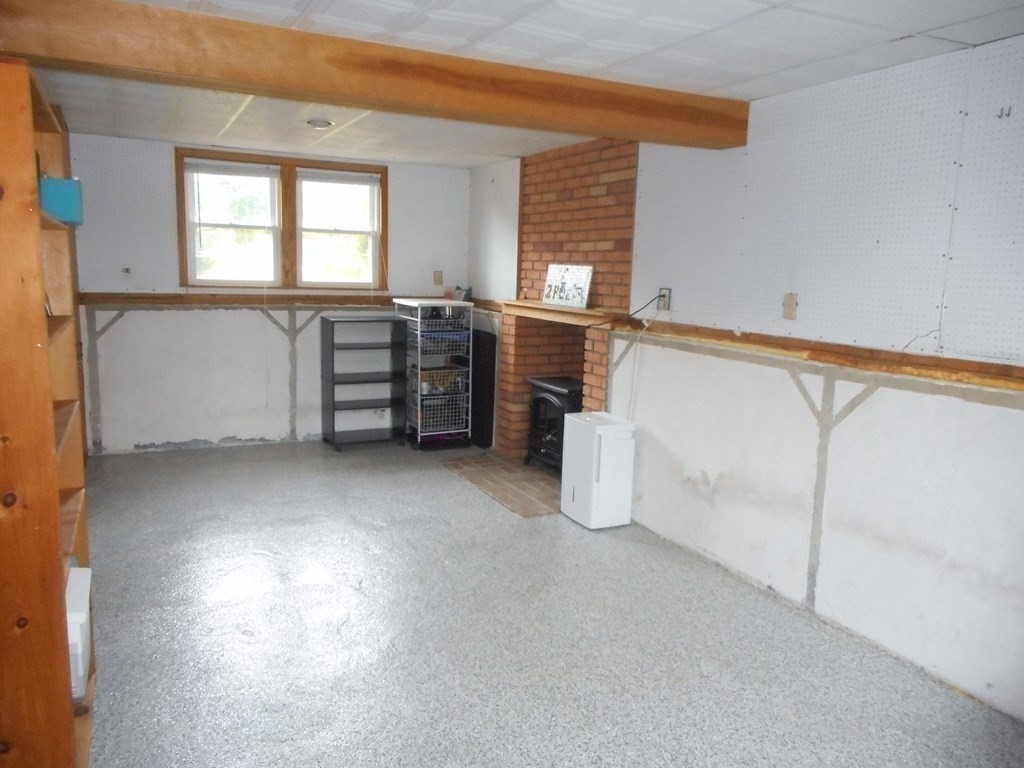 2 Poe Road Billerica, MA 01821 - Photo 24 of 34 a view of a kitchen with furniture and windows