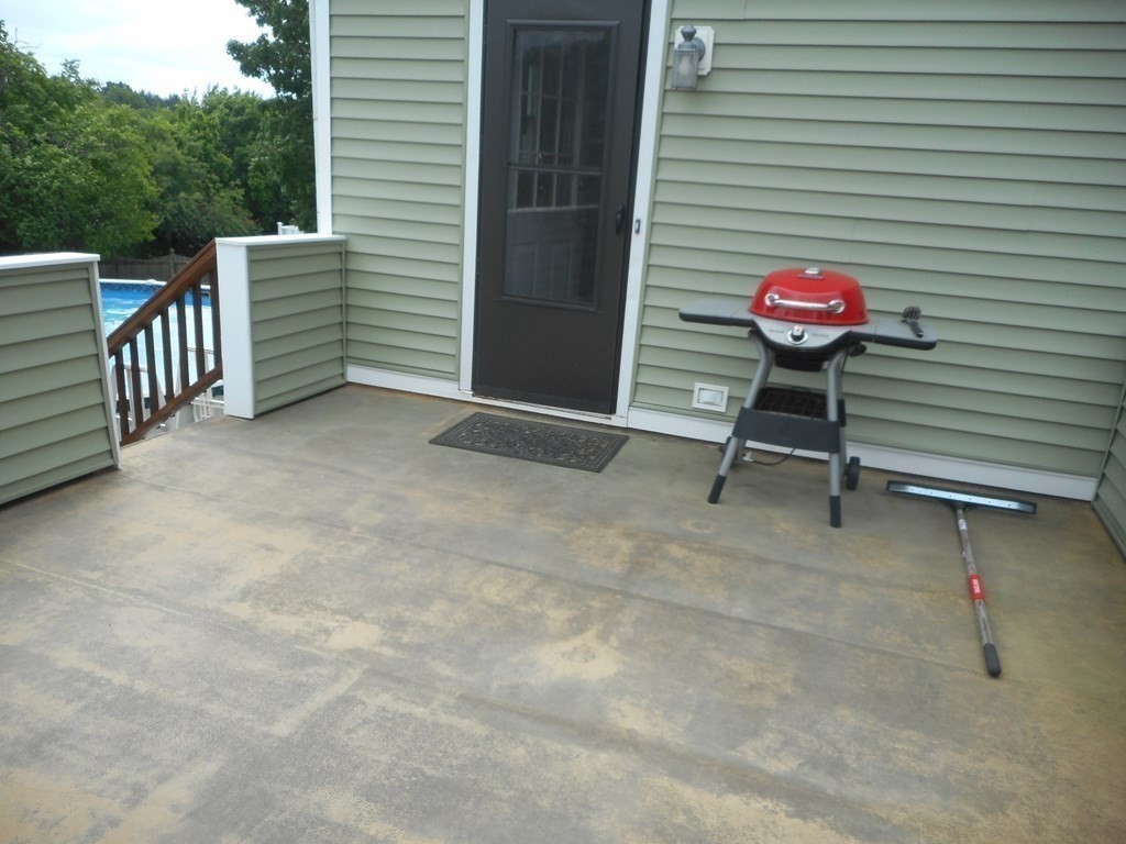 2 Poe Road Billerica, MA 01821 - Photo 29 of 34 a view of a chairs and table in the balcony