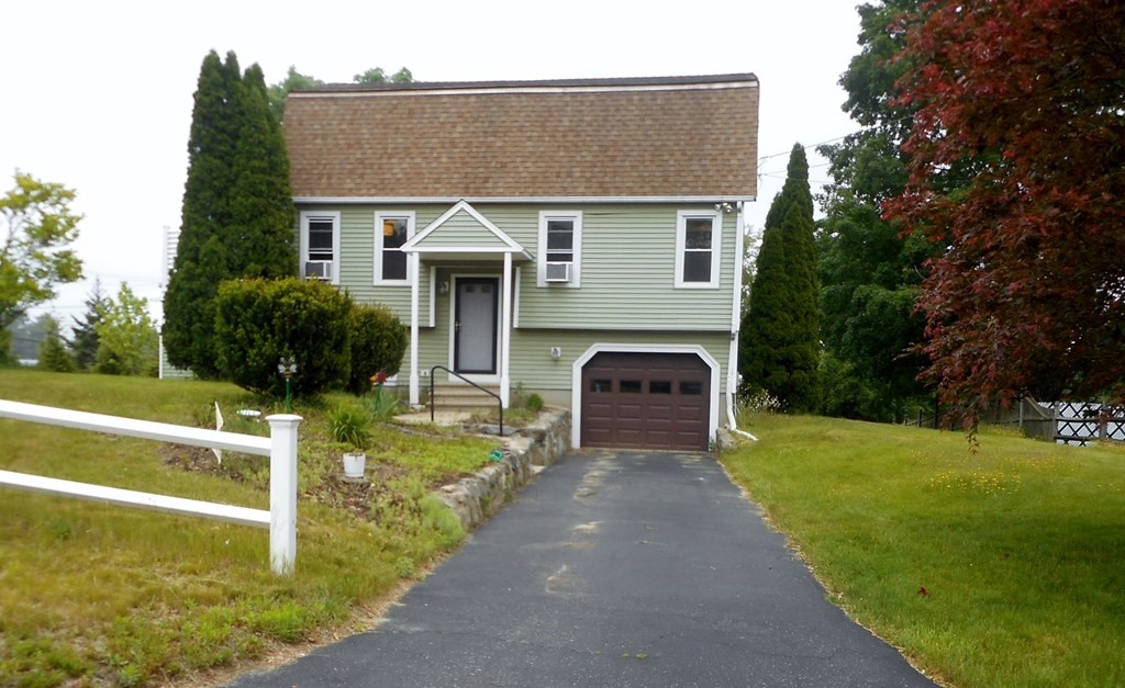 2 Poe Road Billerica, MA 01821 - Photo 3 of 34 a front view of house with yard and green space