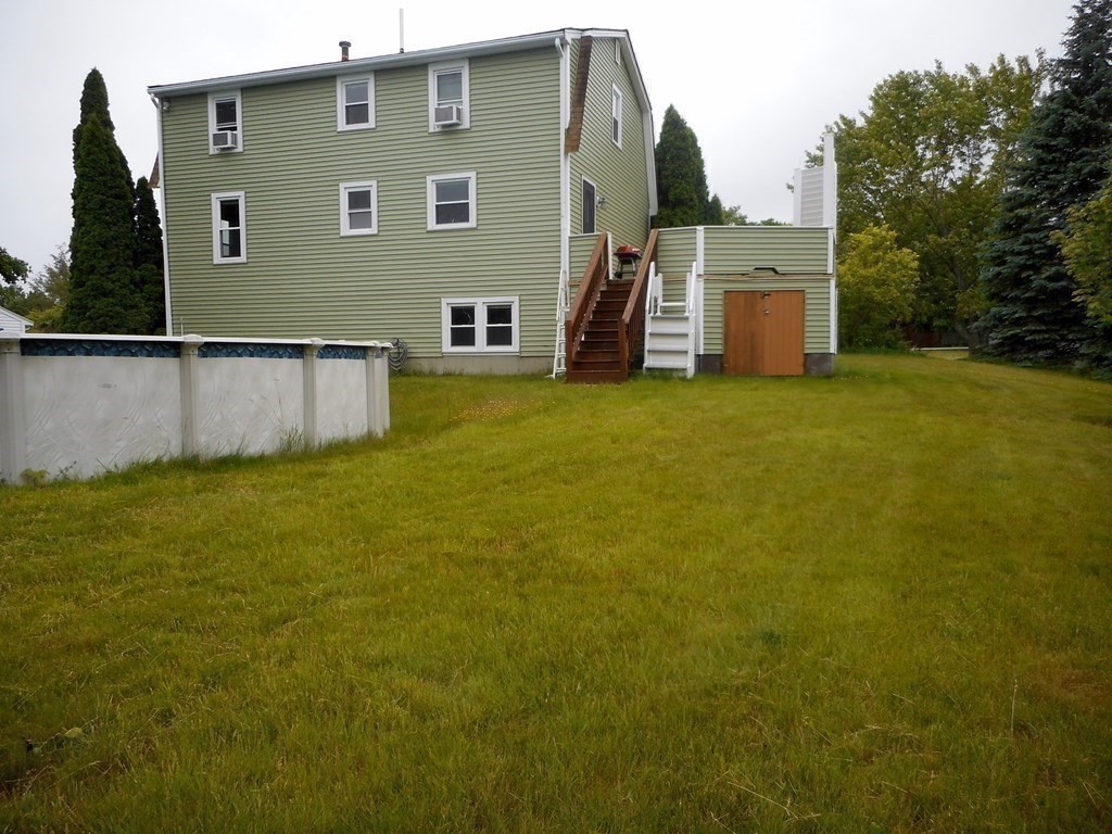 2 Poe Road Billerica, MA 01821 - Photo 31 of 34 a view of a back yard of the house