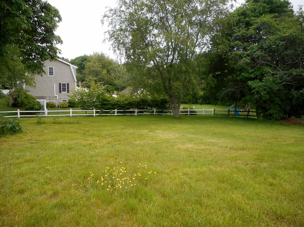 2 Poe Road Billerica, MA 01821 - Photo 34 of 34 a view of a swimming pool with lawn chairs and plants