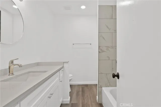 a bathroom with a sink and a tub