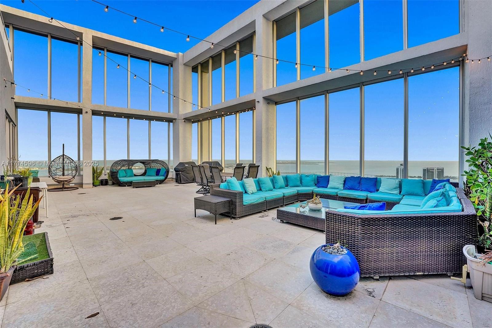 495 Brickell Avenue, Unit PH5701 Miami, FL 33131 - Photo 22 of 31 a room with furniture