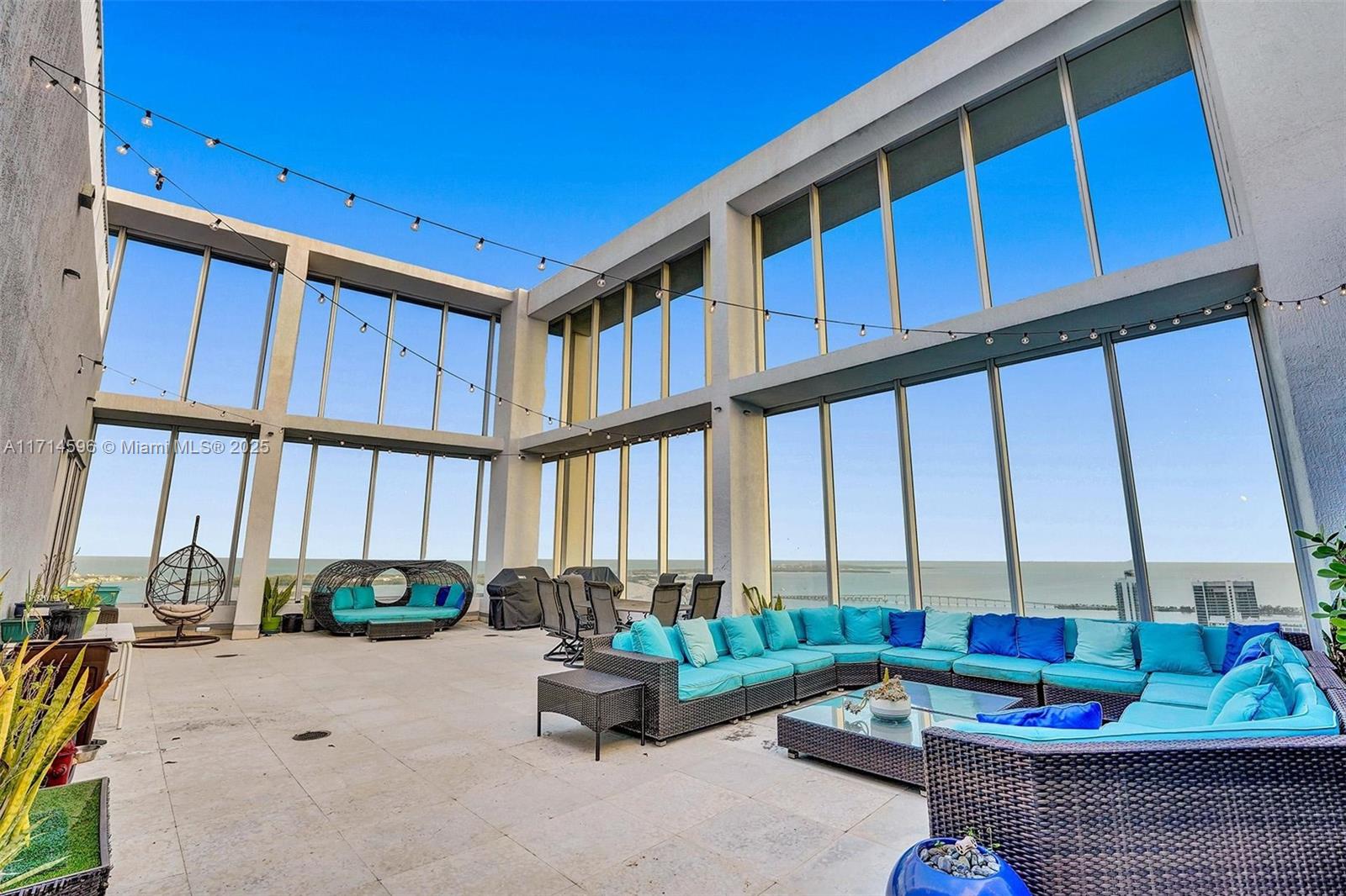 495 Brickell Avenue, Unit PH5701 Miami, FL 33131 - Photo 23 of 31 a living room with furniture