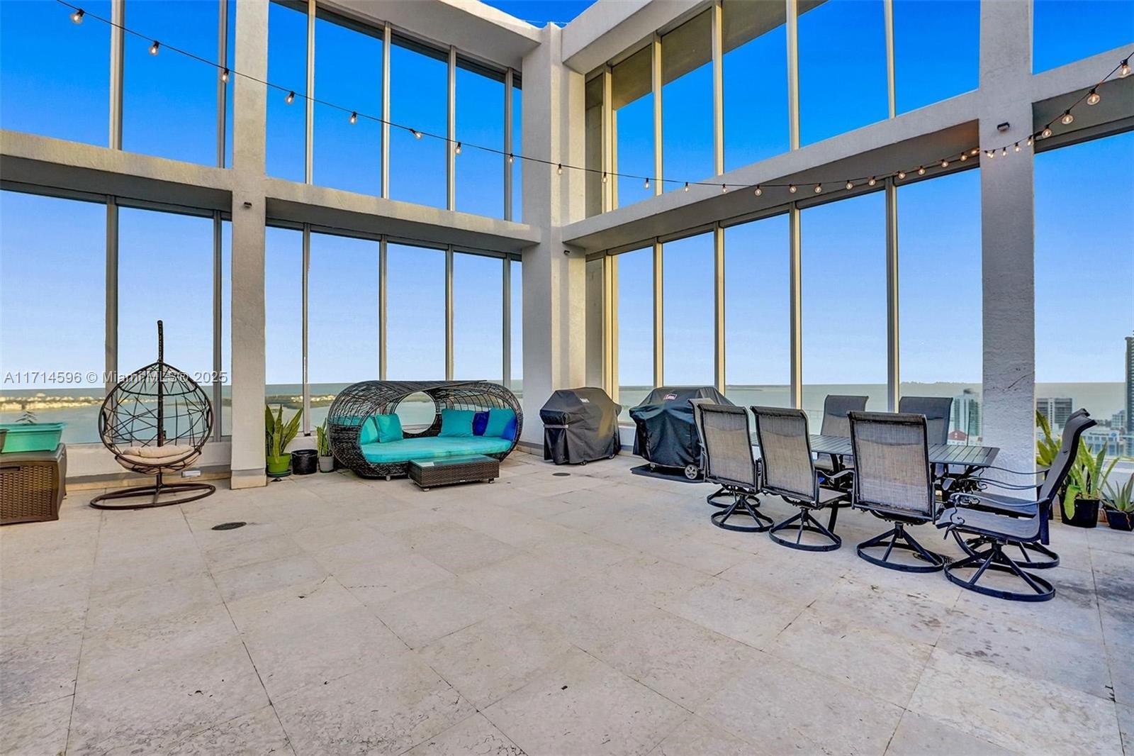 495 Brickell Avenue, Unit PH5701 Miami, FL 33131 - Photo 25 of 31 a view of a room with gym equipment