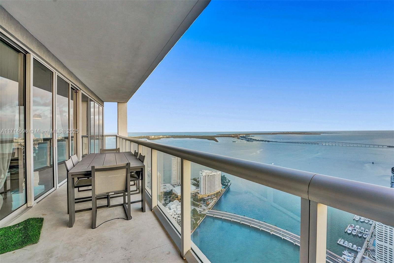 495 Brickell Avenue, Unit PH5701 Miami, FL 33131 - Photo 29 of 31 a view of an ocean with furniture