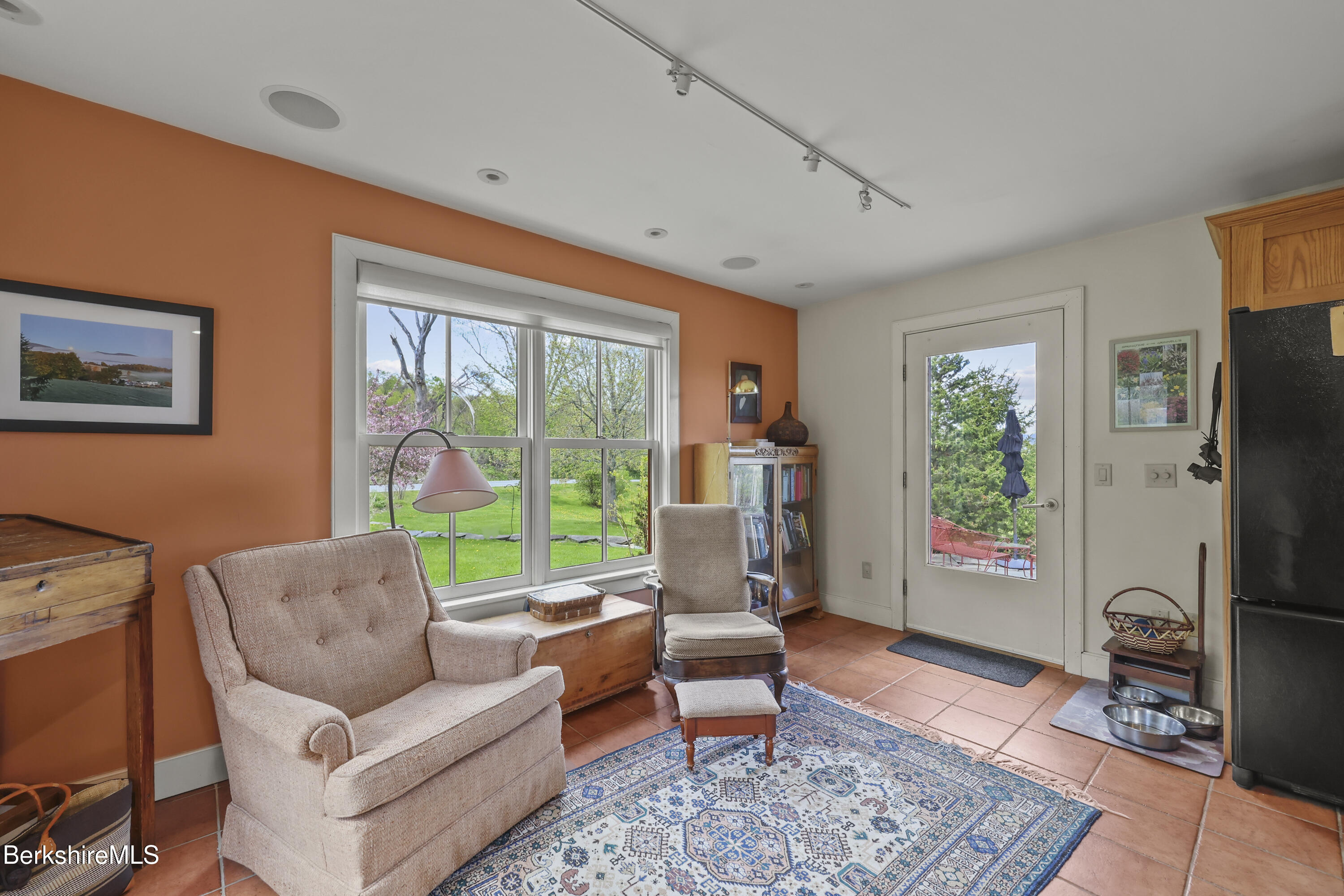 821 Pattison Road North Adams, MA 01247 - Photo 29 of 68 a living room with furniture a flat screen tv and a window