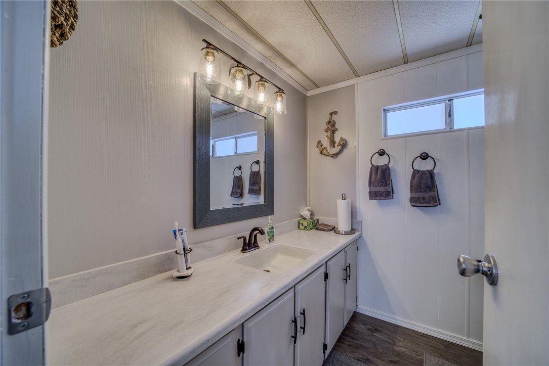4826 Powell Lake Road Topock, AZ 86436 - Photo 29 of 58 a bathroom with a double vanity sink and a mirror