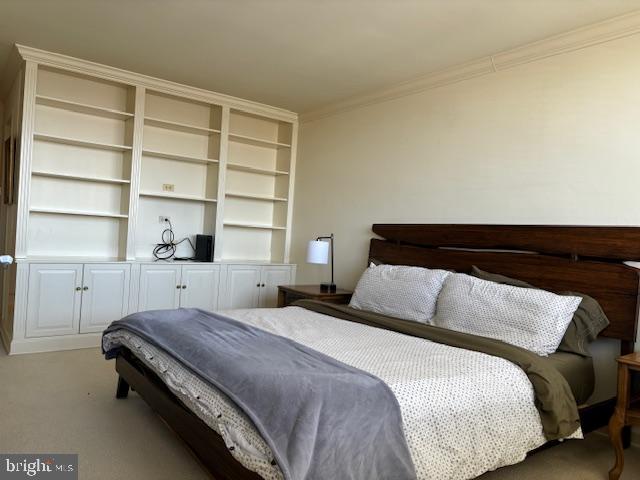 5101 River Road, Unit 1911 Bethesda, MD 20816 - Photo 17 of 32 a bedroom with a bed and a window