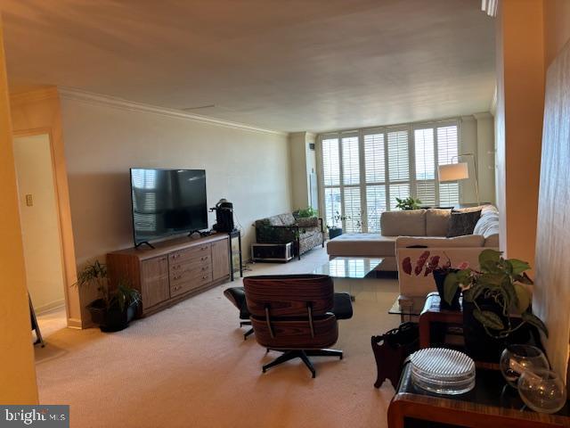 5101 River Road, Unit 1911 Bethesda, MD 20816 - Photo 20 of 32 a living room with furniture and a flat screen tv