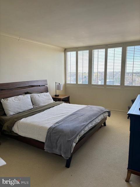 5101 River Road, Unit 1911 Bethesda, MD 20816 - Photo 21 of 32 a bedroom with a bed and a window