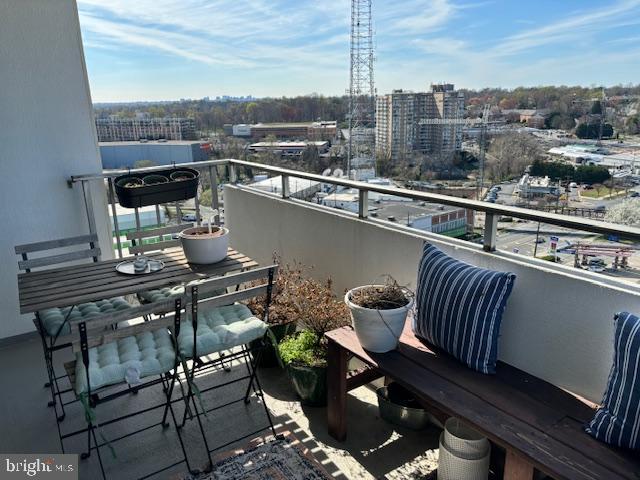 5101 River Road, Unit 1911 Bethesda, MD 20816 - Photo 26 of 32 a view of a balcony with two chairs and a table