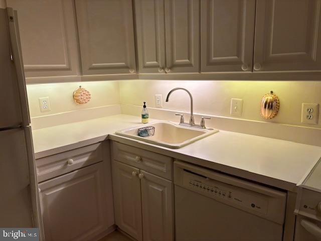 5101 River Road, Unit 1911 Bethesda, MD 20816 - Photo 9 of 32 a kitchen with a sink and cabinets