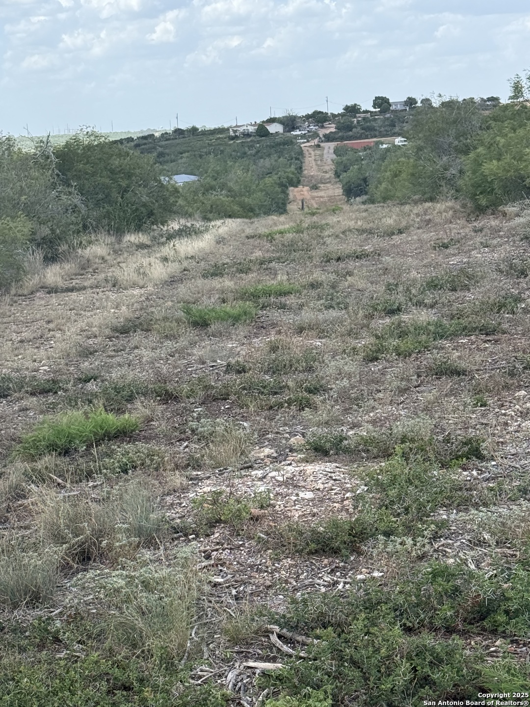 250 6620 Devine, TX 78016 - Photo 6 of 6 a view of a field of grass and trees