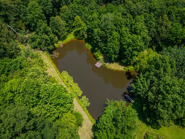 a view of a lake with a yard