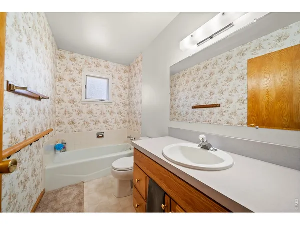 a bathroom with a sink and a bathtub