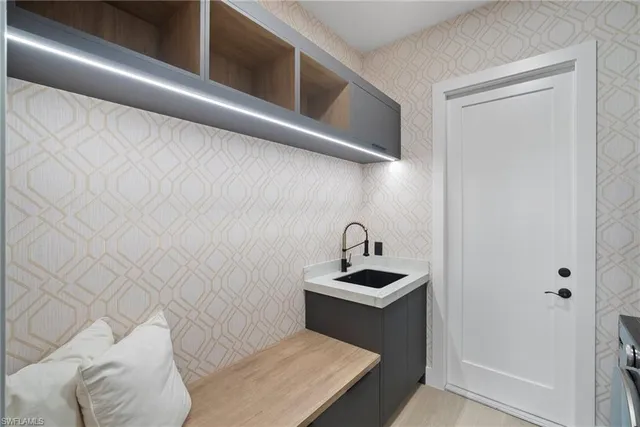 a bathroom with a sink and toilet