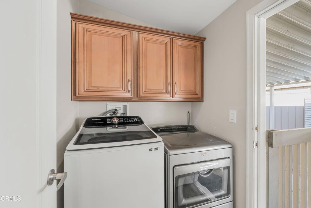 250 East Telegraph Road, Unit 155 Fillmore, CA 93015 - Photo 11 of 39 a view of a storage and utility room with washer and dryer
