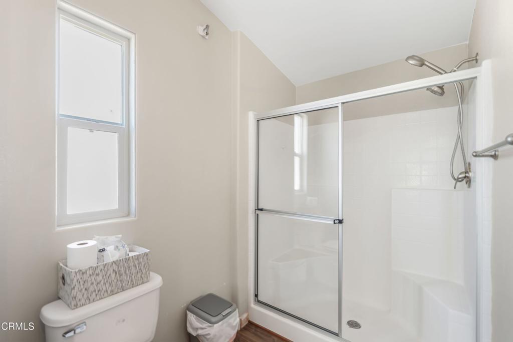 250 East Telegraph Road, Unit 155 Fillmore, CA 93015 - Photo 21 of 39 a bathroom with a shower toilet and sink