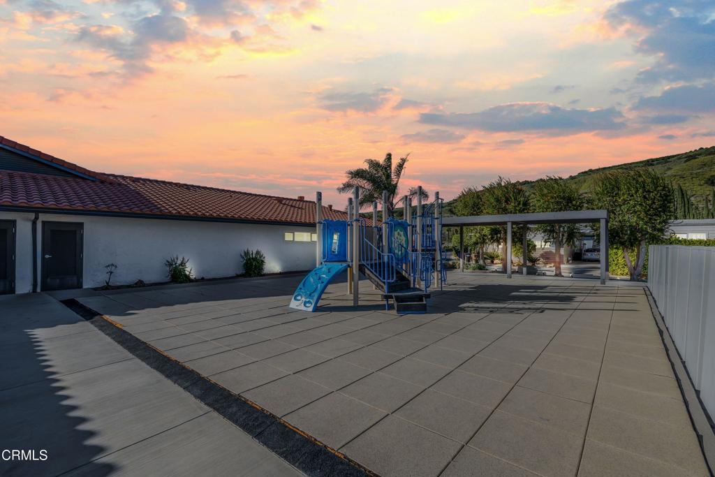 250 East Telegraph Road, Unit 155 Fillmore, CA 93015 - Photo 31 of 39 a view of a house with backyard