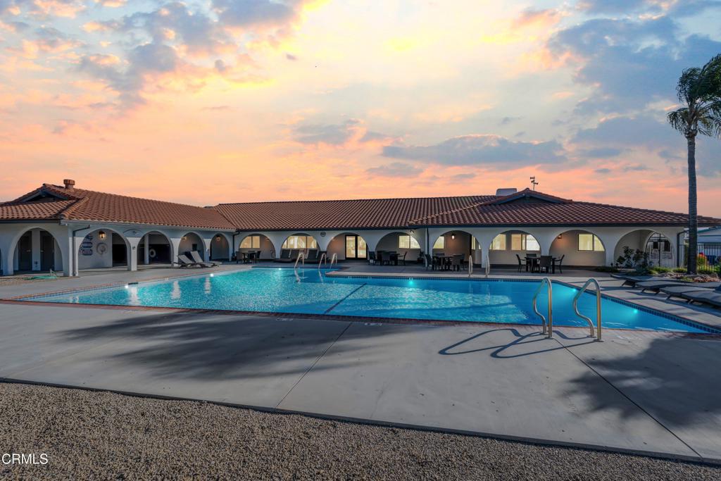 250 East Telegraph Road, Unit 155 Fillmore, CA 93015 - Photo 35 of 39 a front view of a house with a yard